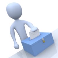 Royalty-free 3d computer generated people clipart picture graphic of a pale blue person putting their voting envelope in a ballot box during a presidential election.